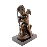 Angled view of Cupid repairing his bow bronze sculpture with classical mythological details