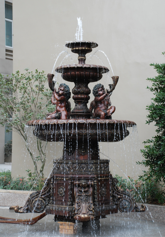 Large custom bronze fountain installed in an outdoor landscape project