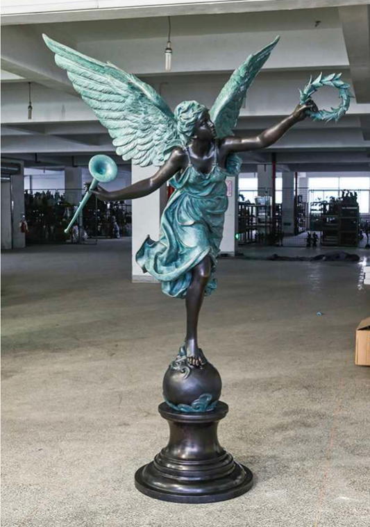 Custom figurative bronze sculpture of a winged female figure