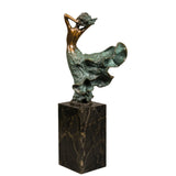 Left view of dancing female bronze sculpture with flowing dress