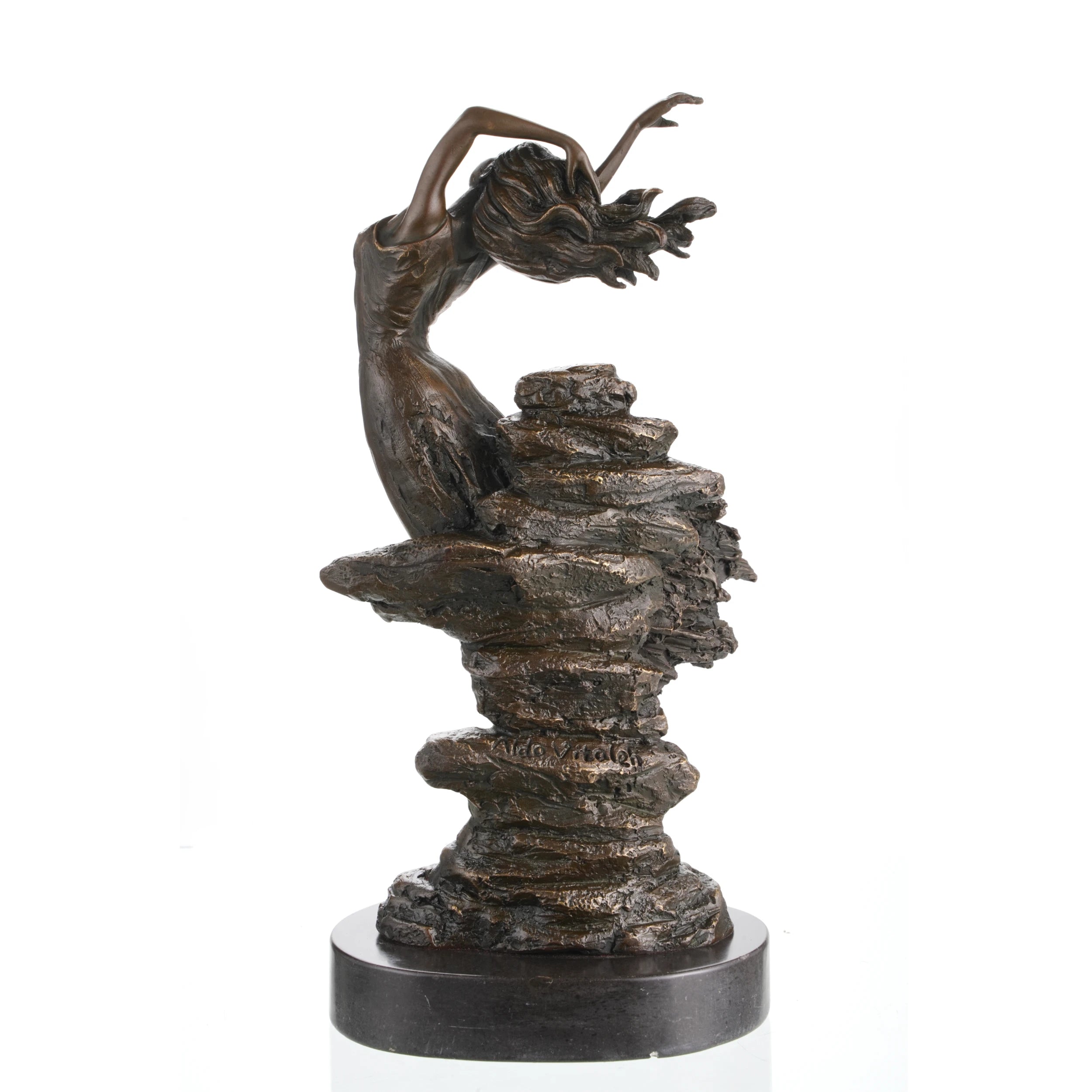 Side profile of bronze dancing maiden sculpture with flowing movement