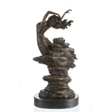 Side profile of bronze dancing maiden sculpture with flowing movement