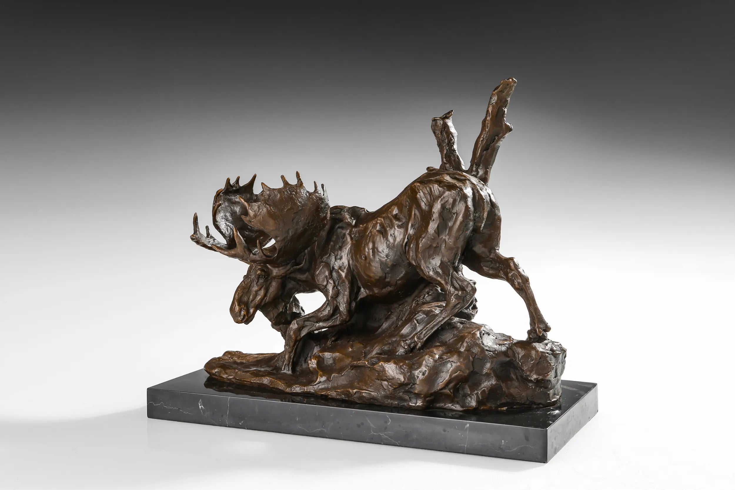 Descending Moose bronze sculpture three-quarter view