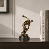 Discus Thrower Bronze Sculpture displayed in a styled interior