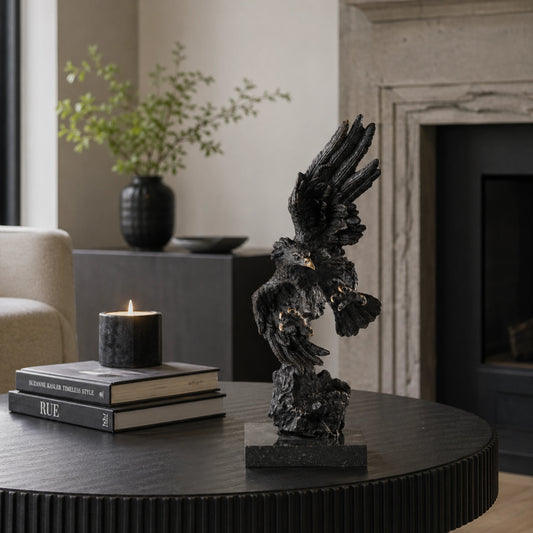 This is a dynamic bronze statue of a bald eagle, crafted using the lost-wax casting method. The piece captures the raptor in a powerful diving pose—wings partially spread, talons extended forward, and body angled downward—conveying the raw intensity and precision of a hunting strike. 