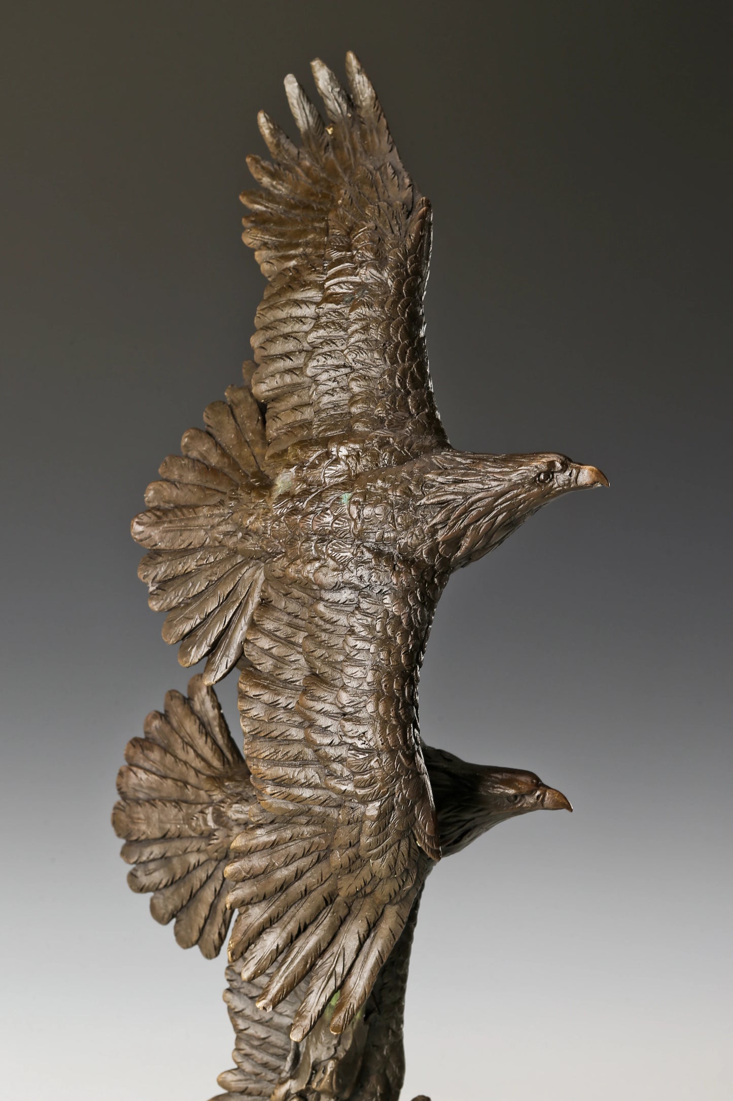 Two eagles soaring bronze sculpture with detailed feathers and marble base. Elegant wildlife statue for home decor, office, or collectors.