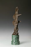 Solid bronze twin eagles soaring statue on green marble base, luxury office desk decor for executives.
