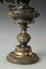 Elegant bronze eagle sculpture with ornate pedestal and detailed feathers. A refined statement piece symbolizing strength, control, and authority.