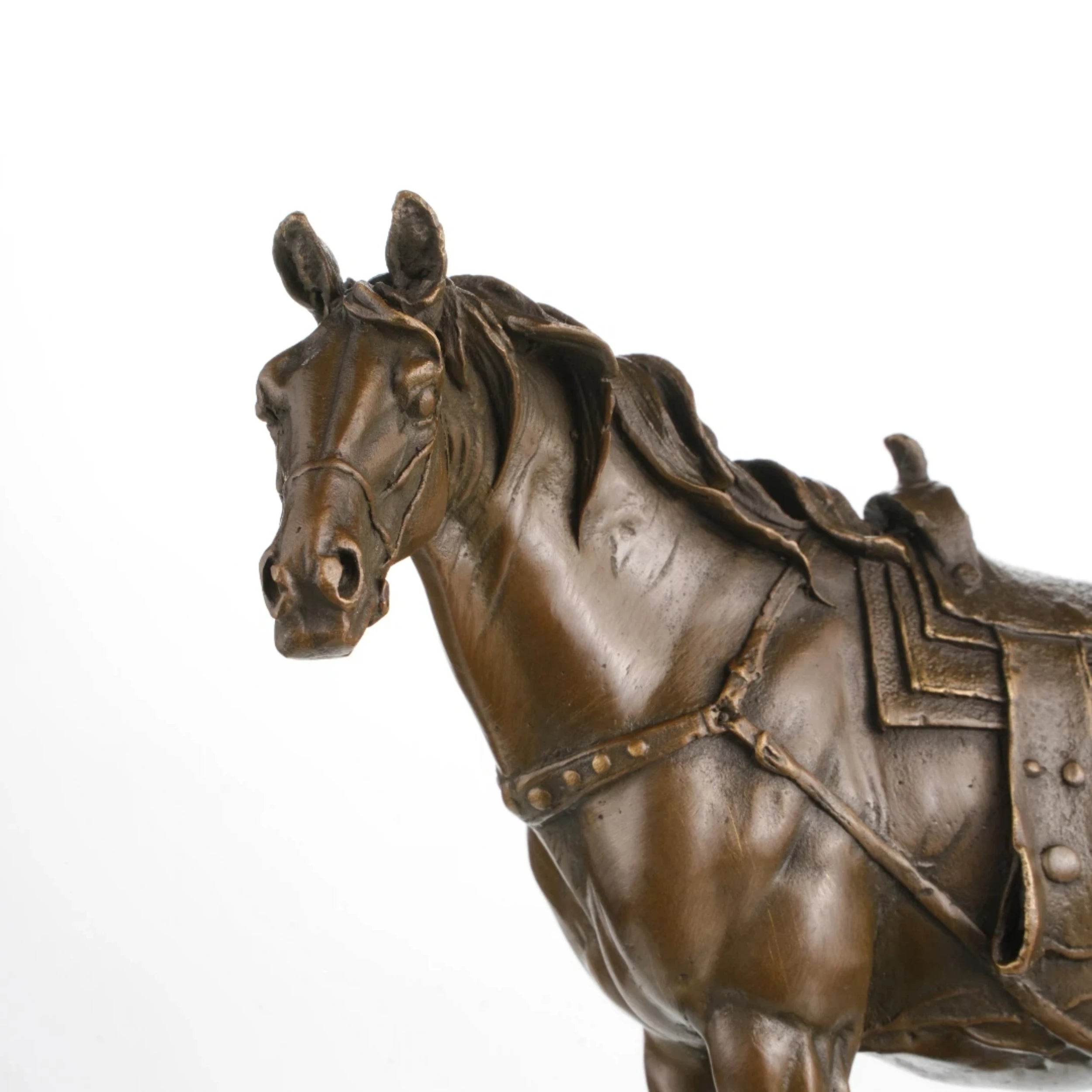 Close-up of saddle and bridle craftsmanship in bronze