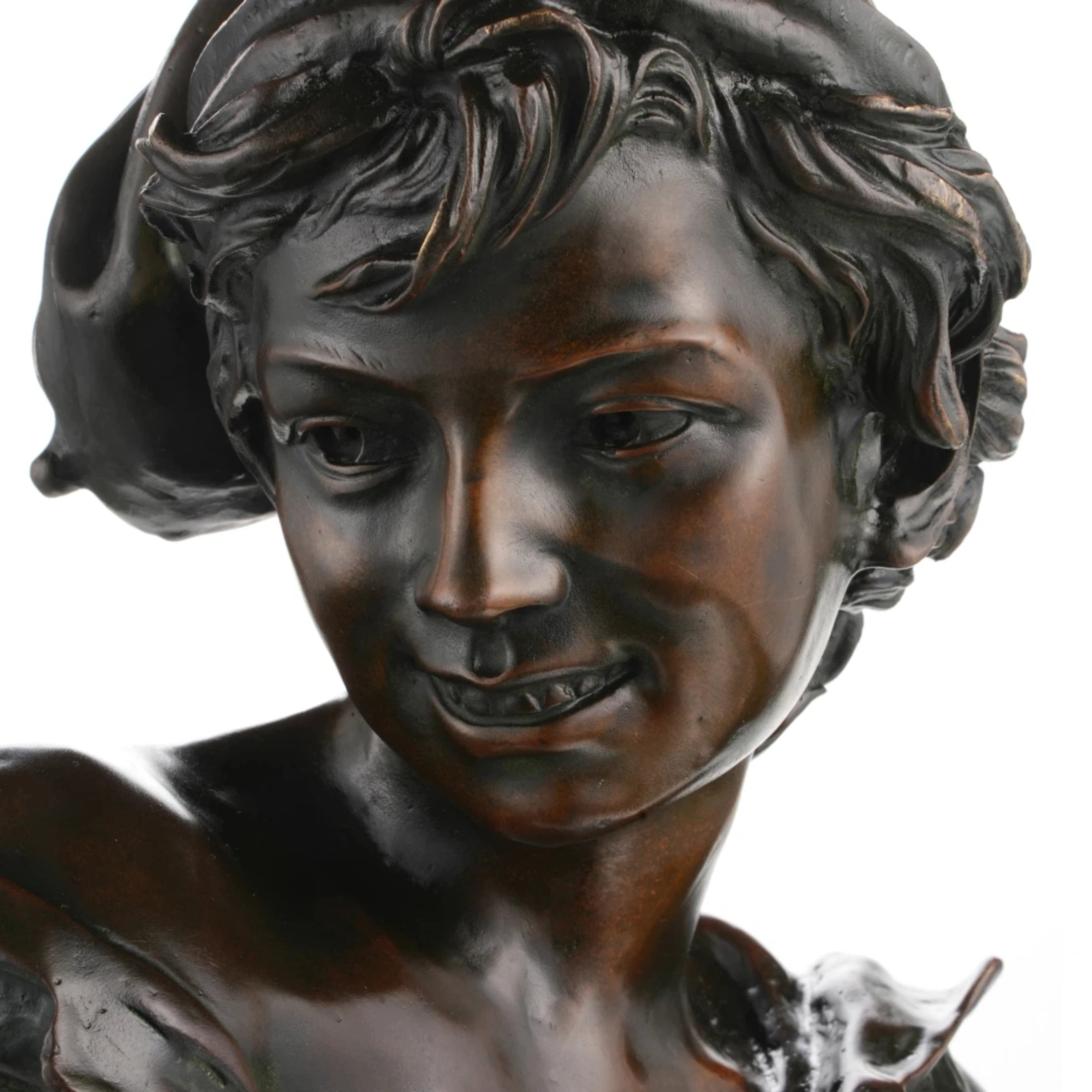 Neoclassical bronze bust sculpture of a Neapolitan fisherboy in Carpeaux style. A finely detailed collectible artwork with rich patina and classical craftsmanship.