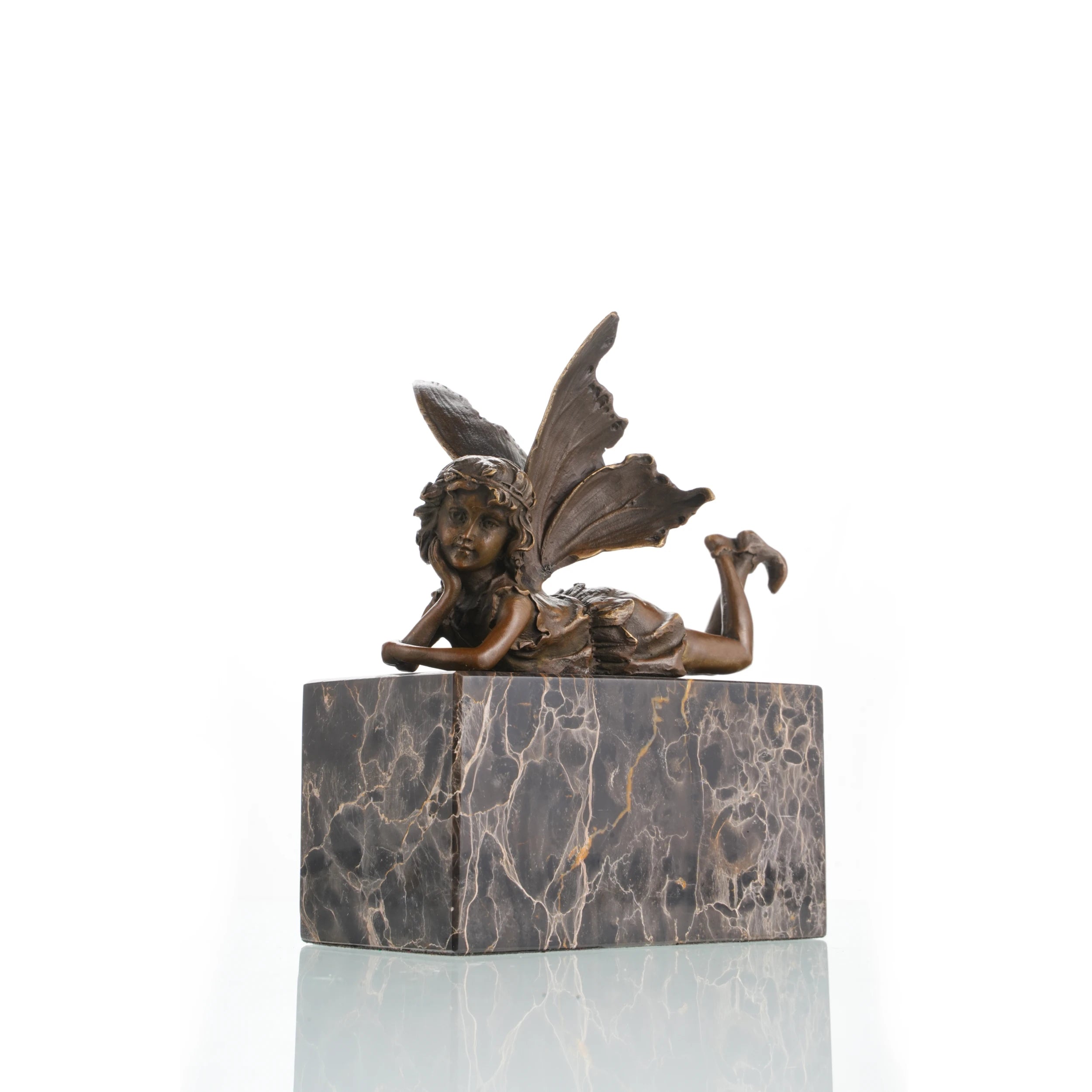 Whimsical bronze reclining fairy sculpture with butterfly wings on gold-veined marble base, magical fantasy art for bedroom decor.