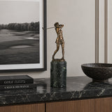 Female Golfer Swing Bronze Sculpture displayed in a modern interior
