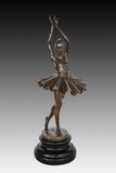 handcrafted ballerina bronze statue showing the elegant dance pose and detailed tutu