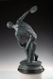 Classical Discobolus bronze sculpture inspired by ancient Greek art. A timeless discus thrower statue symbolizing athleticism, balance, and beauty.