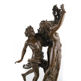Dramatic bronze Cupid and Psyche sculpture in tender embrace, mythological love and soul statue on oval black marble base, loss wax casting romantic fine art.
