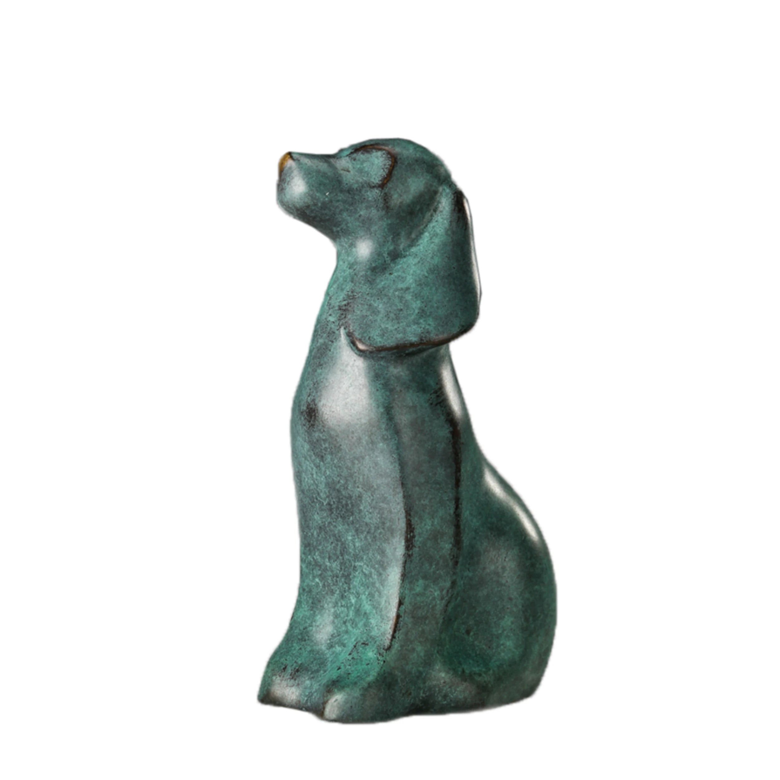 Handcrafted bronze seated dog sculpture with deep green patina and head raised upward