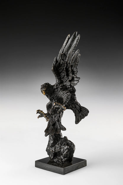 Dynamic bald eagle bronze sculpture in a powerful diving pose with marble base. A striking wildlife statue symbolizing strength, freedom, and leadership.