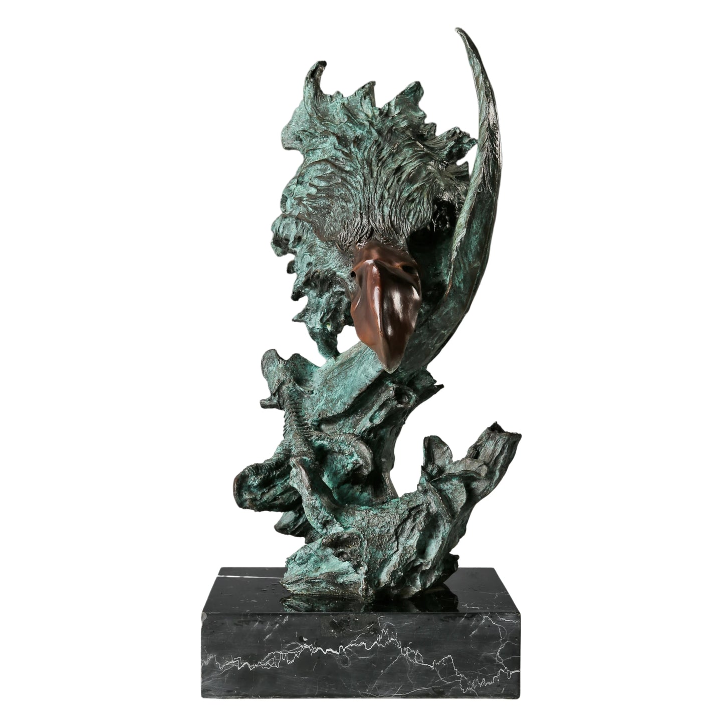 Abstract bronze eagle head sculpture with striking verdigris patina and marble base. A bold wildlife statue symbolizing freedom, strength, and vision.
