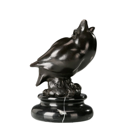 a modern abstract bronze owl sculpture with smooth minimalist lines and a black marble base. A stylish symbol of wisdom, perfect for contemporary home or office decor.