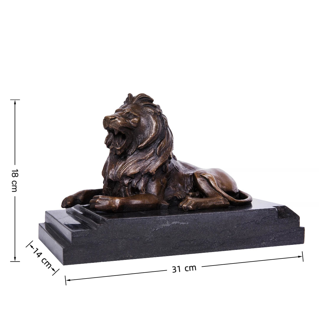 This is a powerful bronze lion sculpture, cast using the lost-wax method, depicting the animal in a reclining pose with its mouth open in a fierce roar. The sculpture features a rich, aged bronze patina that highlights the intricate, flowing details of its mane and the taut musculature of its body, conveying a sense of primal strength and authority. The lion’s head is raised, and its expression is intense, while its body rests in a relaxed yet alert posture, suggesting a moment of warning or dominance.