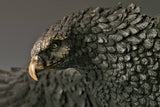 Majestic bald eagle bronze sculpture with wings spread and talons extended. A powerful wildlife statue symbolizing freedom, strength, and leadership.