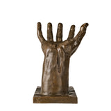 Helping Hand Surreal Bronze Sculpture on a clean white background