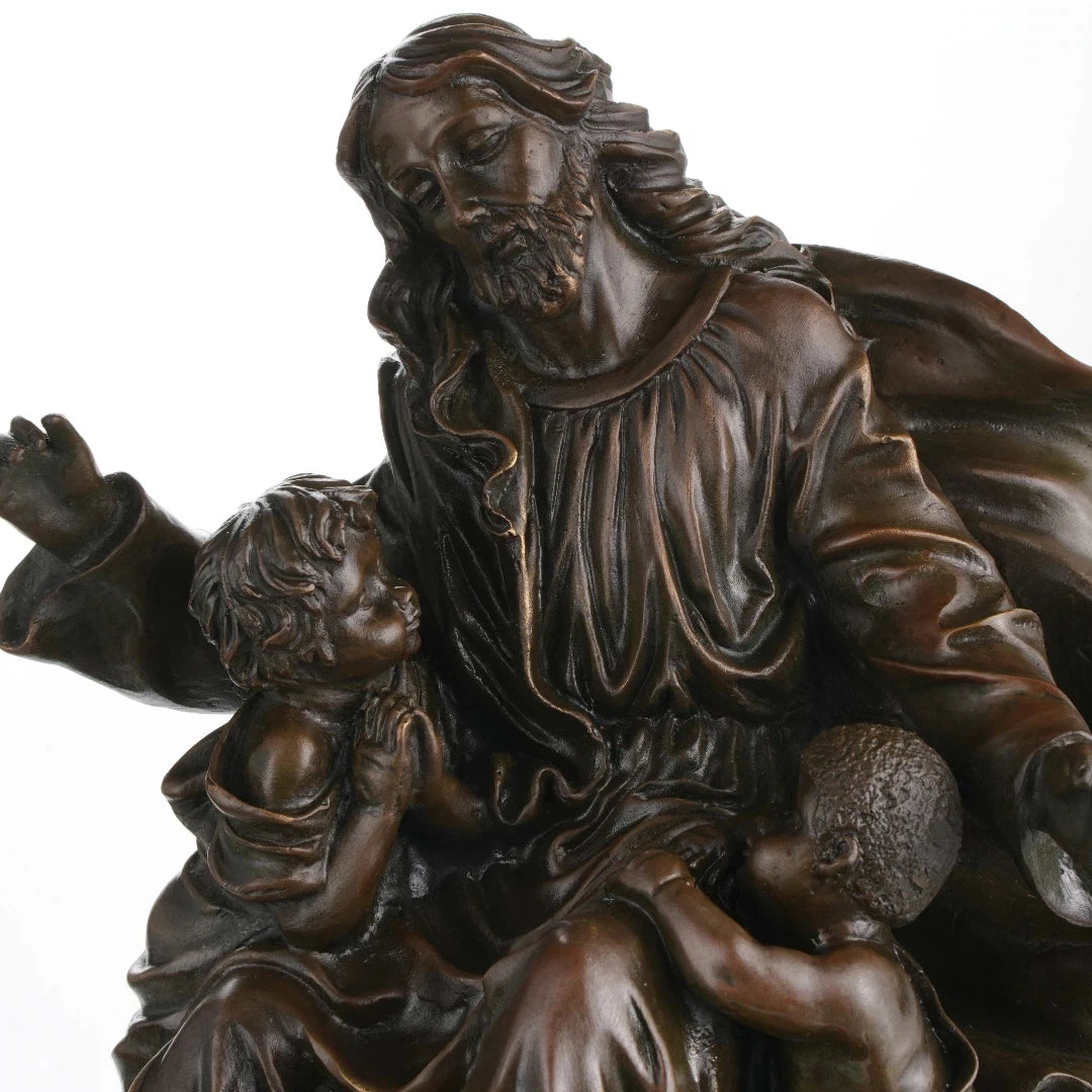 Close-up of Jesus compassionate expression in bronze
