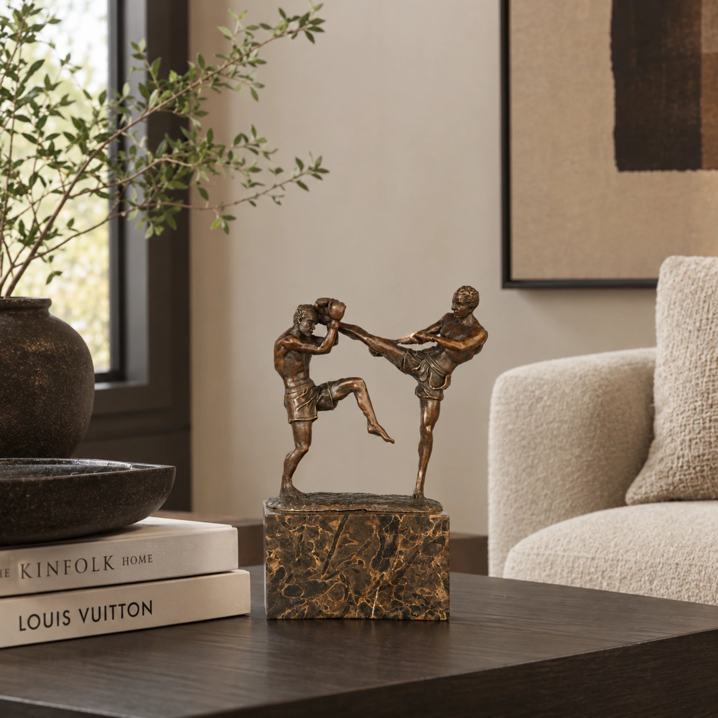 Kickboxing Fighters Bronze Sculpture displayed in a modern interior