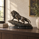 Lion on Rock Bronze Sculpture displayed in a minimalist interior