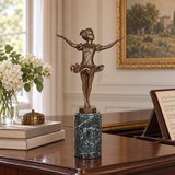Little ballerina bronze sculpture displayed in an elegant bedroom as decorative art