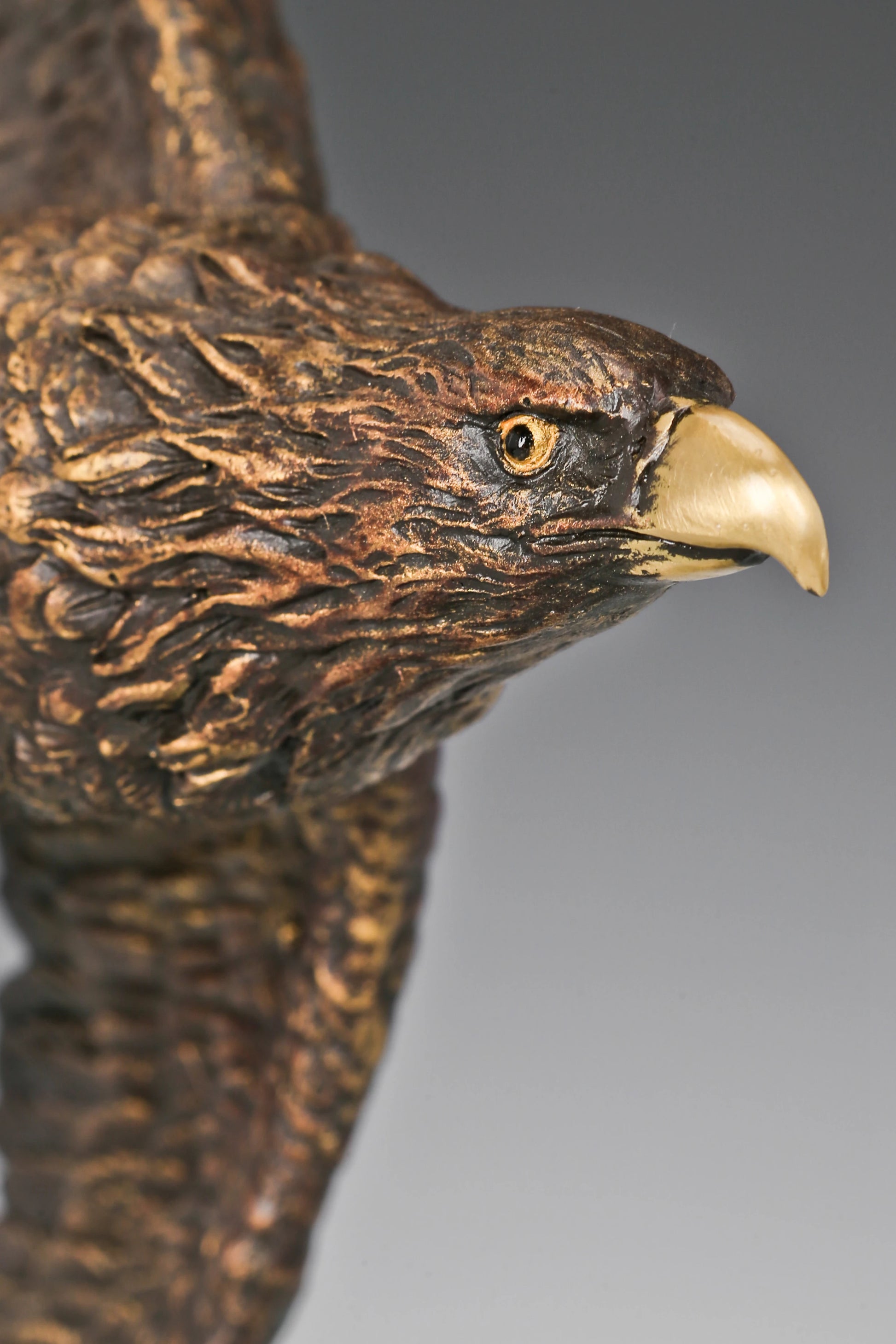 Eagle taking flight bronze sculpture with detailed feathers . Perfect wildlife statue for home decor, office, and collectors.
