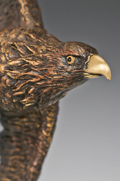 Eagle taking flight bronze sculpture with detailed feathers . Perfect wildlife statue for home decor, office, and collectors.