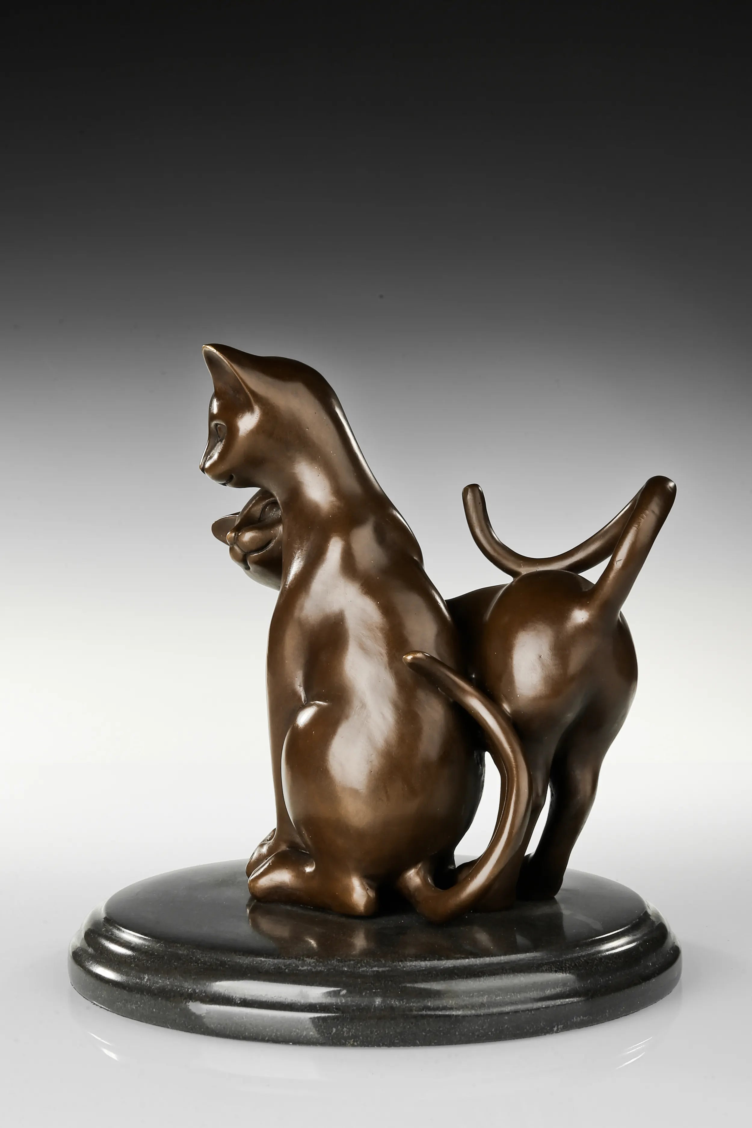 Left view of handcrafted loving cats bronze sculpture
