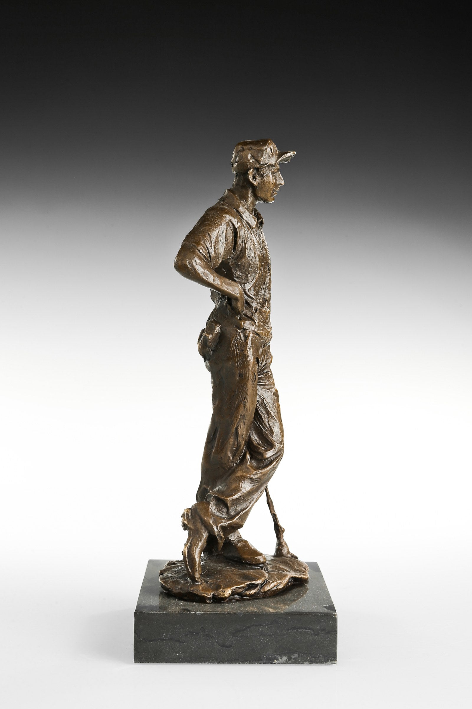 Male Golfer bronze sculpture, opposite-angle studio view