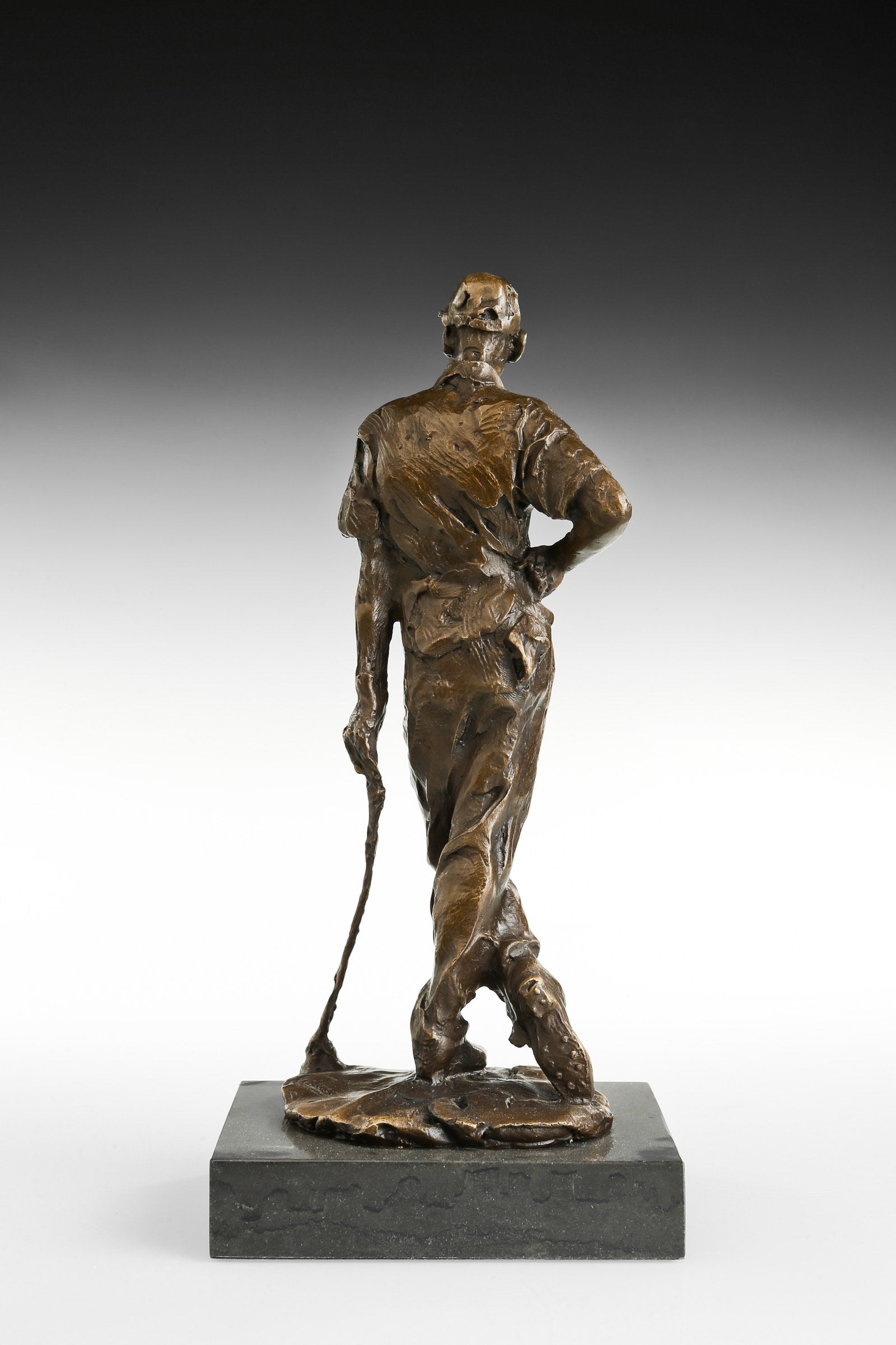 Male Golfer bronze sculpture, rear studio view