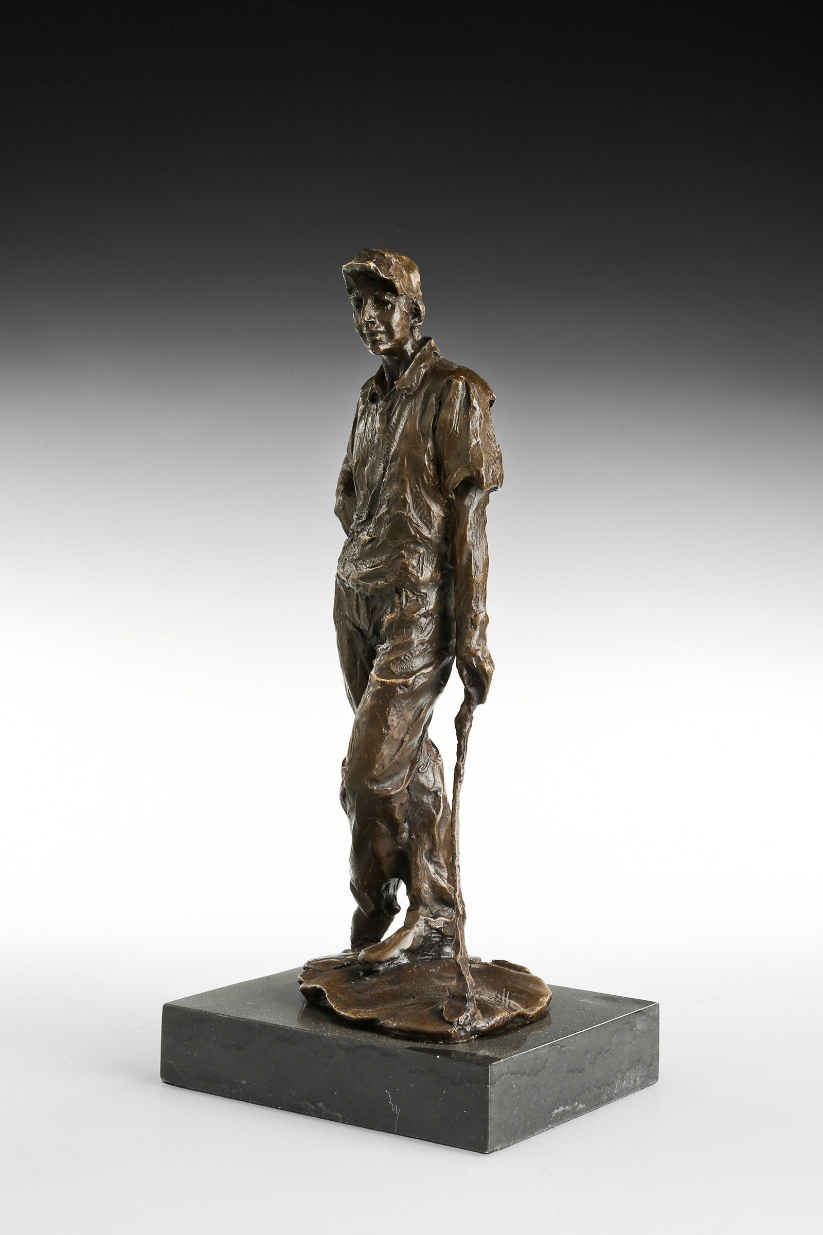Male Golfer bronze sculpture, three-quarter studio view