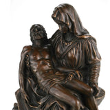 Virgin Mary sorrow expression detail in bronze Pietà sculpture