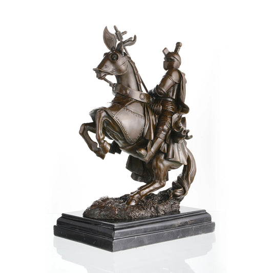 Medieval knight in plate armor on rearing horse bronze statue, detailed horse barding and armor sculpture  on black marble base, loss wax casting historical art.