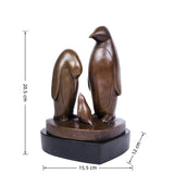 minimalist penguin family sculpture handcrafted from solid bronze. Warm finish, clean lines, and timeless elegance for modern shelves, desks, and interiors.