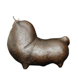 a modern bronze bull sculpture featuring a smooth minimalist form and handcrafted bronze finish.