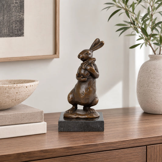 Mother Rabbit and Bunny Bronze Sculpture displayed in a styled interior