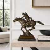 Native American horse rider bronze sculpture displayed in a refined Western-style interior
