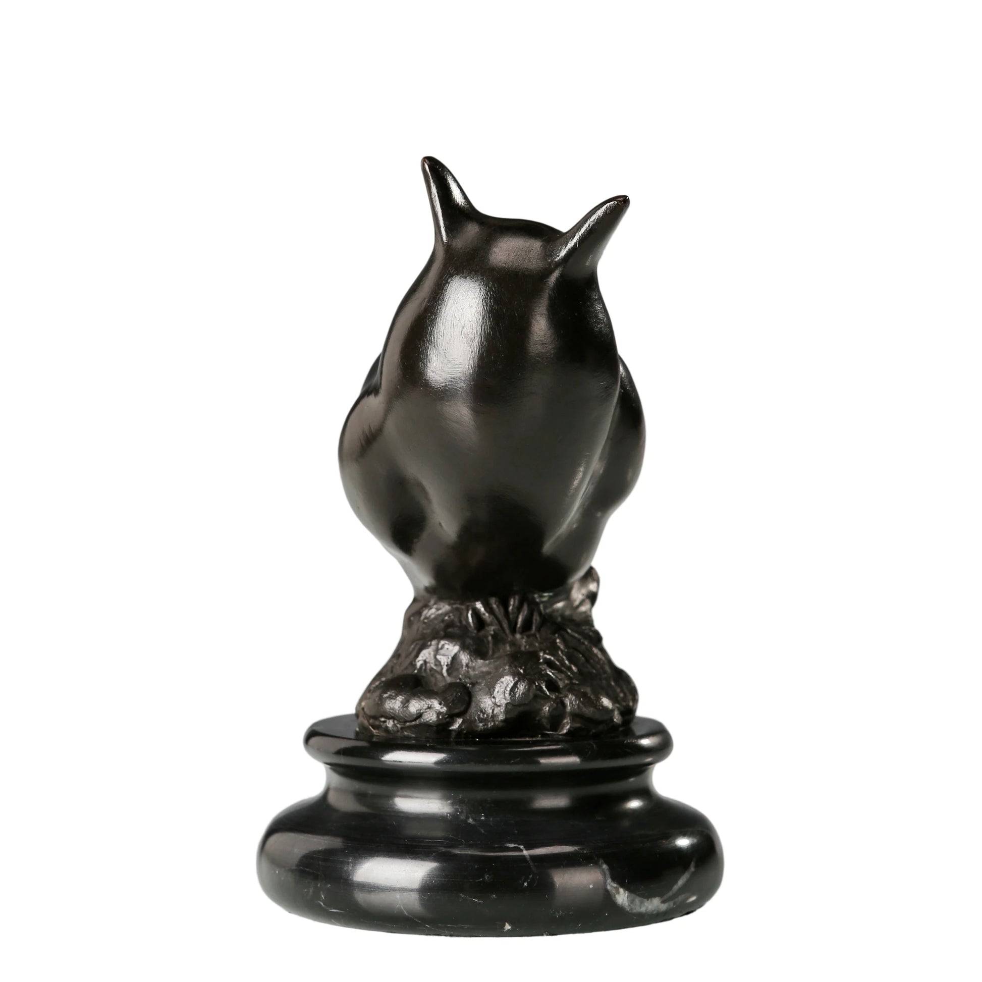 a modern abstract bronze owl sculpture with smooth minimalist lines and a black marble base. A stylish symbol of wisdom, perfect for contemporary home or office decor.