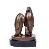 This penguin family bronze sculpture captures a tender moment between three penguins, rendered in clean, minimalist lines that emphasize form, balance, and emotional connection. Expertly crafted from solid bronze, the sculpture features a warm, natural finish that enhances its timeless character and tactile appeal. 