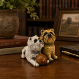 Playful bronze puppy pair sculpture with ball displayed as cheerful home and shelf decor