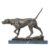 handcrafted pointing bronze hunting dog sculpture in a tail-up tracking pose with head lowered