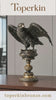 Handcrafted Bronze eagle statue with wings partially spread, detailed feathers and decorative base. Classical wildlife sculpture for home decor, office, or collectors.