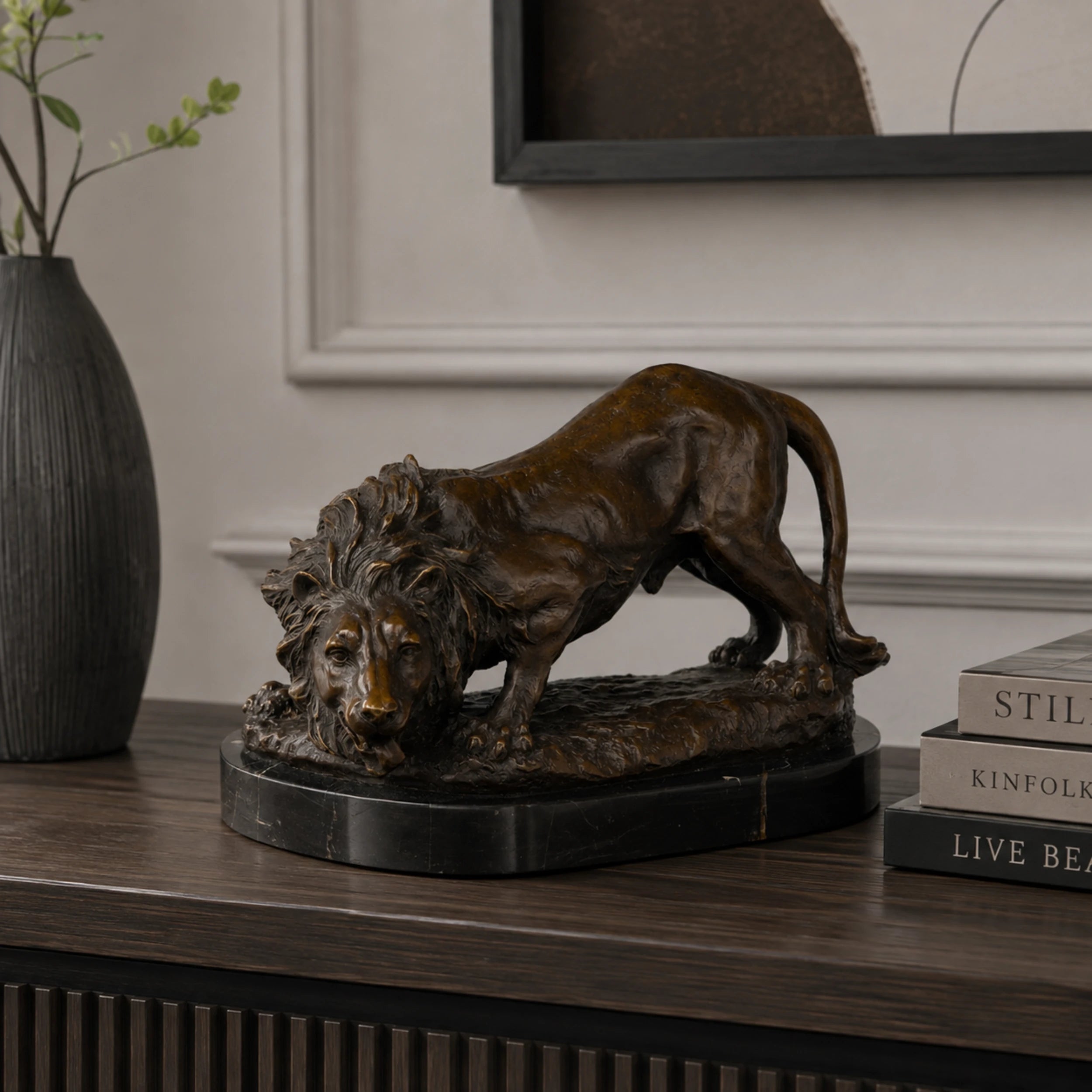 Prowling bronze lion sculpture displayed as powerful executive office and luxury home decor