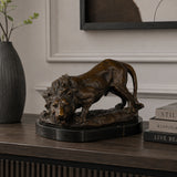 Prowling bronze lion sculpture displayed as powerful executive office and luxury home decor