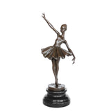 Front view of reaching ballerina bronze sculpture with one arm raised and a flowing tutu